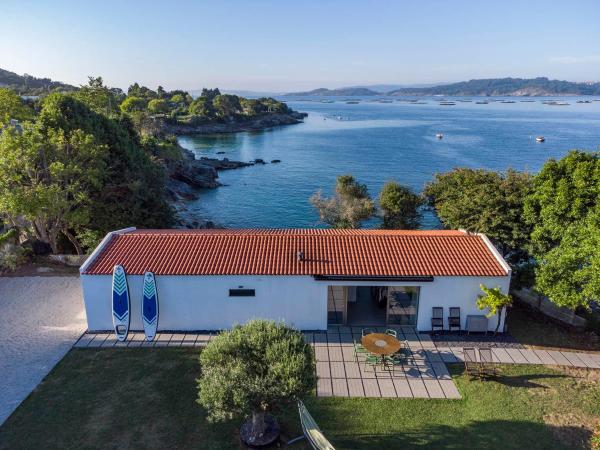 A Factoria Beach House by Prishomes, Rezerwuj Dom wakacyjny Hotele w Galicja z parkingiem, Parking