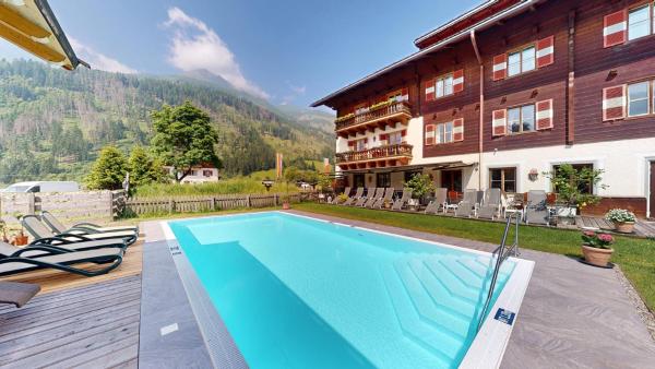 Hotel Schlosswirt, Rezerwuj  Hotele w Grossglockner z basenem, Basen
