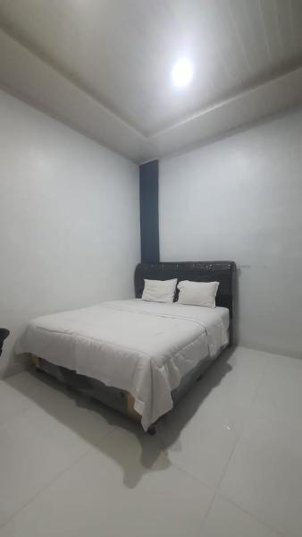 SPOT ON 92481 Modena Homestay Syariah Near SD Negeri, Rezerwuj  Hotele w North Sumatra Province z parkingiem, Parking