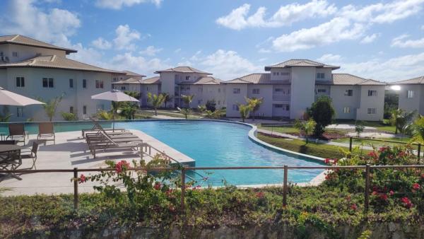 Apartamento no Village dos Ipês em Praia do Forte, Rezerwuj  Hotele w Bahia z Basenem, Basen