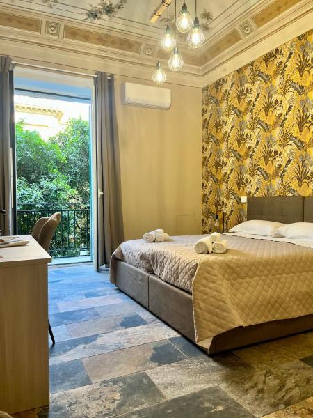 B&B Dimora Emily, Rezerwuj  Hotele w Sycylia z parkingiem, Parking