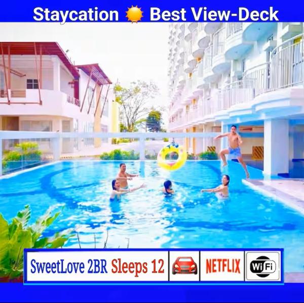Tagaytay Hideaway 2-Bedrooms, Sleeps 12 in CITYLAND Prime Condo with Big Living room, Kitchen, Free Swimming Pool, 2 Parking, Wi-Fi, Netflix, Perfect View-Deck on 24F rooftop, Rezerwuj  Hotele w Iruhin z Basenem, Basen