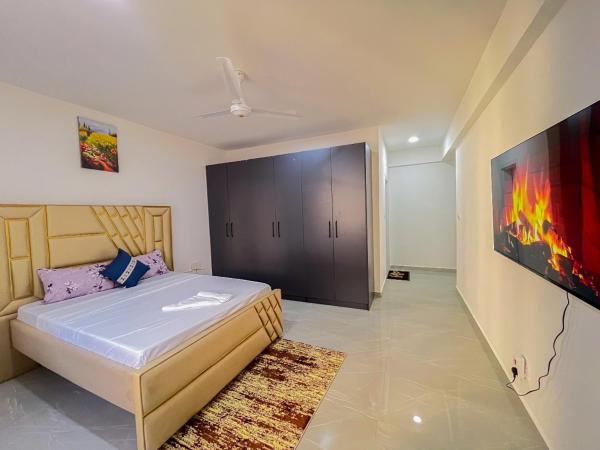 Madzo Holiday homes, Rezerwuj  Hotele w Coast Region z Basenem, Basen
