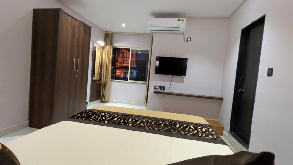 Amrut Inn, Rezerwuj  Māvalli Karnataka