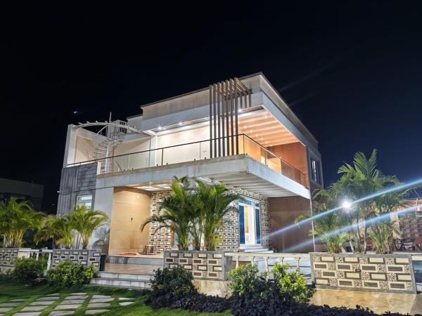 Silver Nest Farms 3BR Villa with Pool by Homeyhuts, Rezerwuj  Hajdarabad 