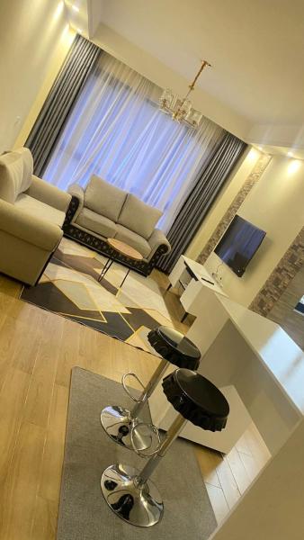 spacious executive one bedroom apartments with breathtaking city views swimming pool ,well equipped gym ,child playground and ample parking space, Rezerwuj  Hotele w Nairobi z Basenem, Basen